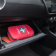 Glovebox carrying First Aid Kit
